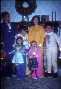The traditional Christmas eve family pose circa 1976. I'm in the new blue Footie PJ's and so excited about my new doll from grandma.