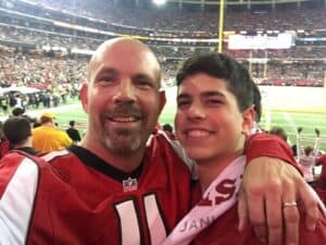 father and son at Atlanta Falcons game