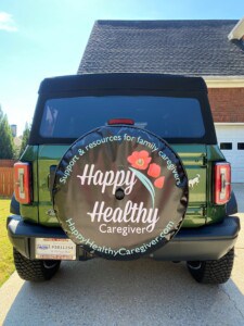 Verde, my Ford Bronco and my Happy Healthy Caregiver personalized tire cover