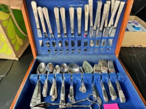 photo of wooden box filled with organized flatware